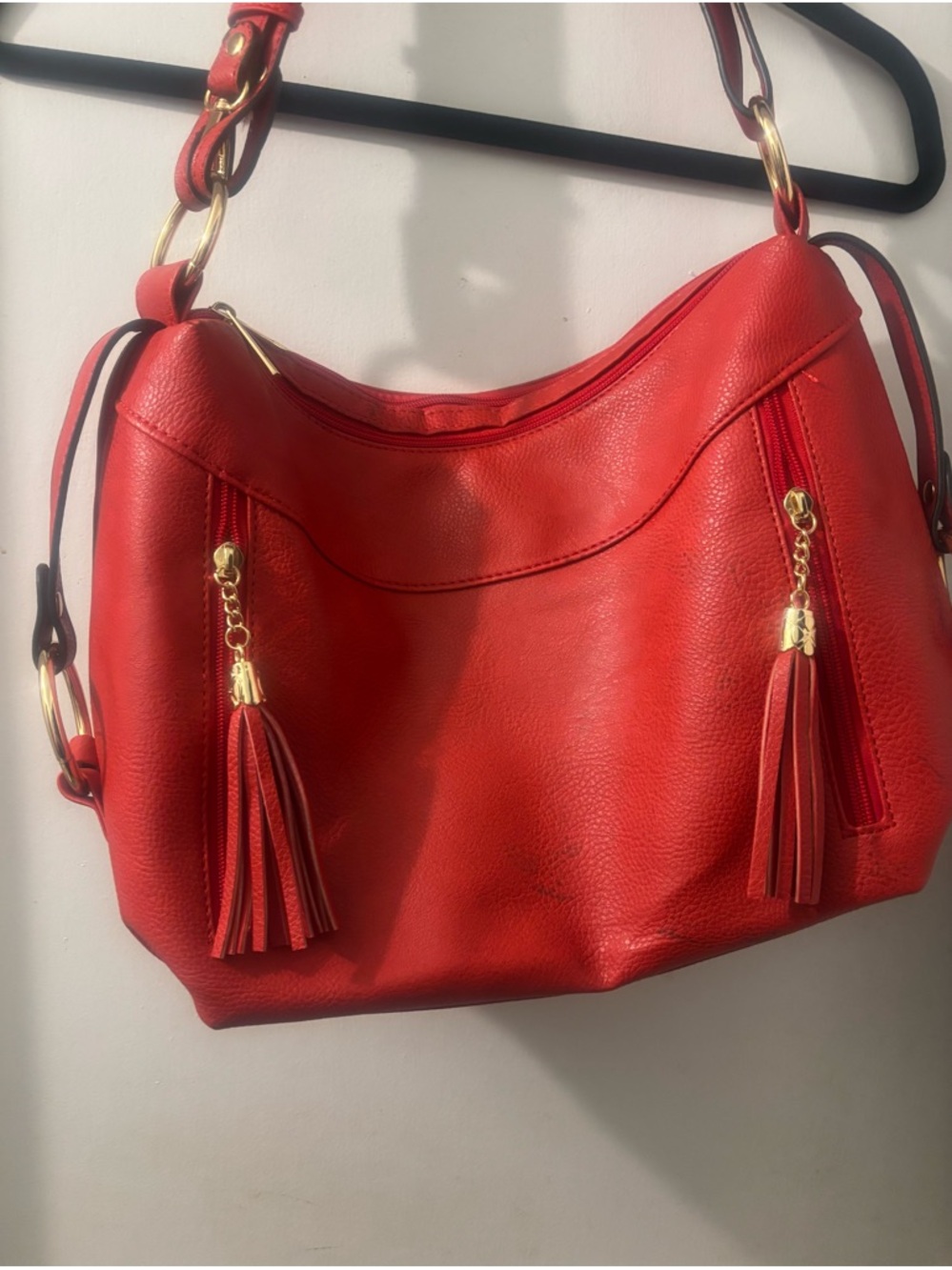 Charming Charlie Red Tassel Shoulder Bag with Gold Accents